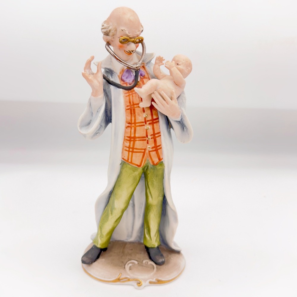 Vintage Pucci Capodimonte Figurine Country Doctor Holding Infant Baby